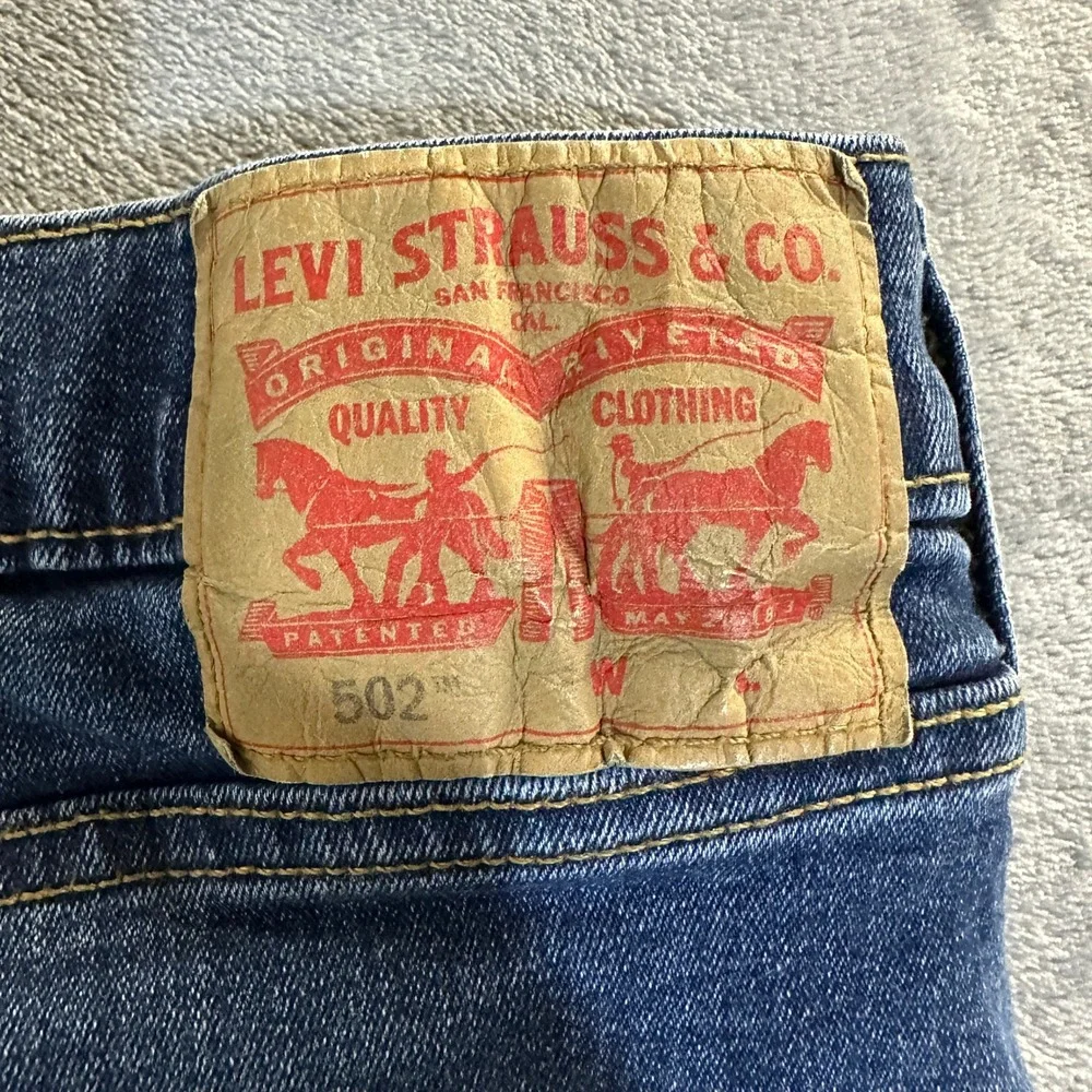 Levis 502 Regular Taper Jeans Mens 46x32 Blue Medium Wash WaterLess Denim
